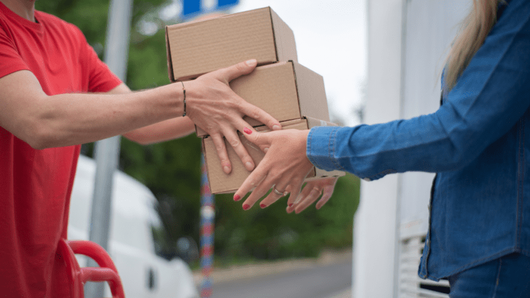 a person handing a package to another person