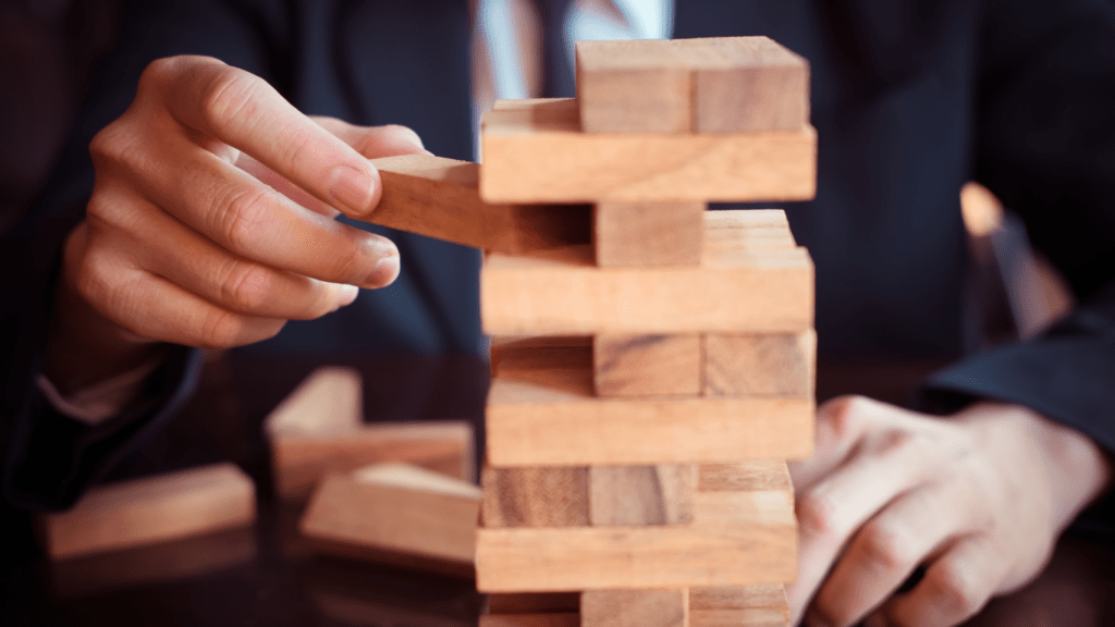 A person playing Jenga