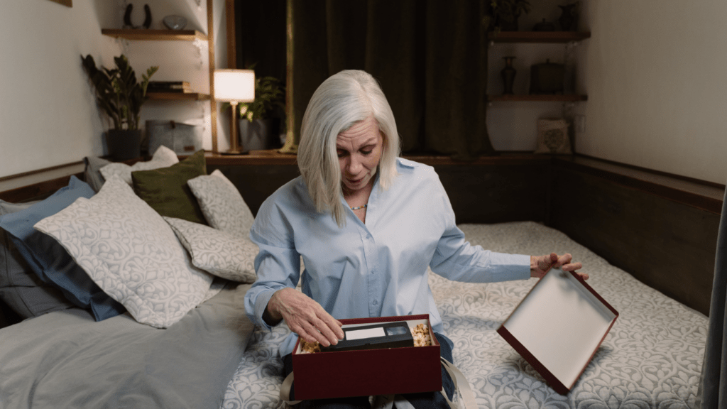 a person sitting on a bed