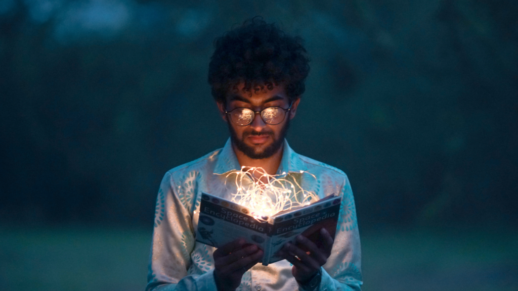 Man holding a mystery book concept