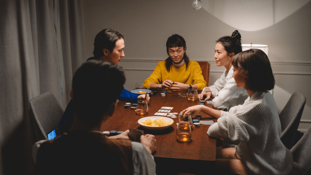 a group of people playing games at night