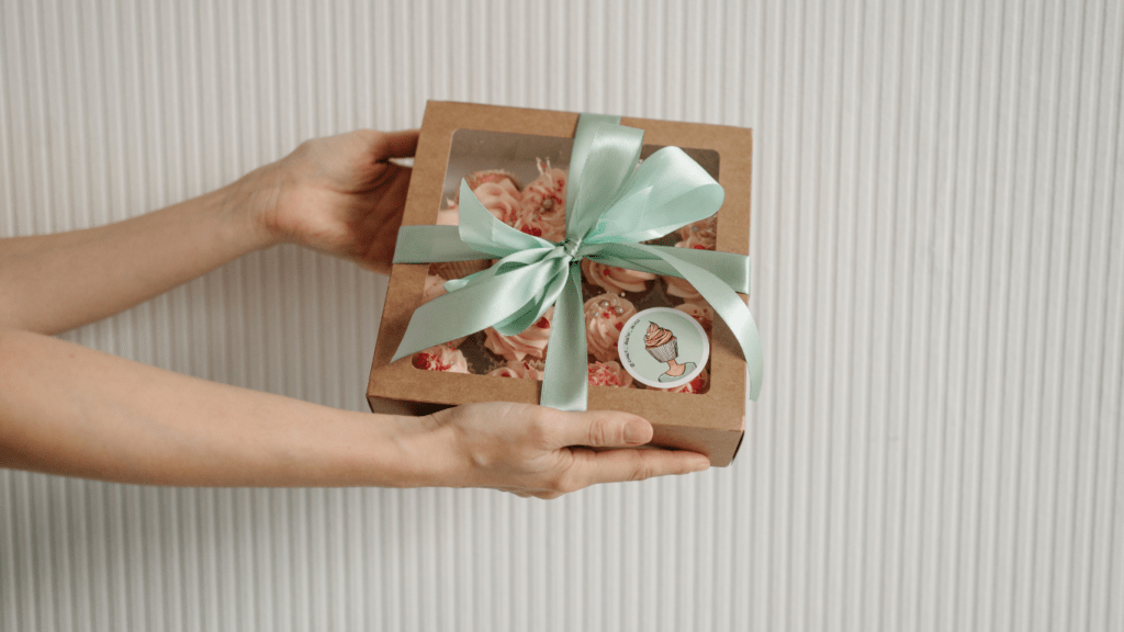 a person holding a gift box