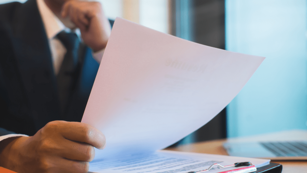 a person holding a piece of paper