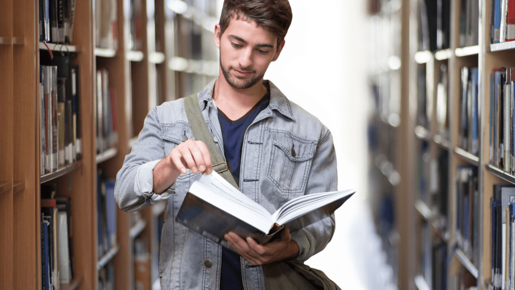 image of a person holding a book