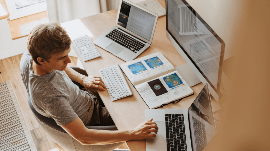 person working on their laptops